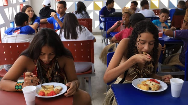 euclides da cunha, bahia, brazil - setembro 18, 2023: students from a public school having a meal at the teaching unit