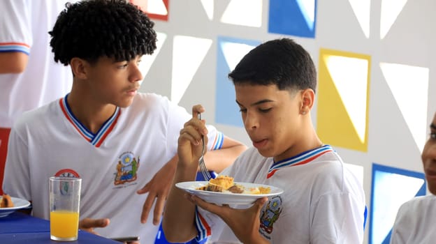 euclides da cunha, bahia, brazil - setembro 18, 2023: students from a public school having a meal at the teaching unit