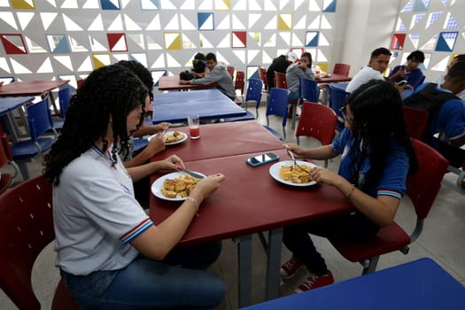 euclides da cunha, bahia, brazil - setembro 18, 2023: students from a public school having a meal at the teaching unit