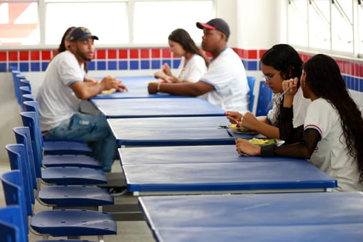euclides da cunha, bahia, brazil - setembro 18, 2023: students from a public school having a meal at the teaching unit.