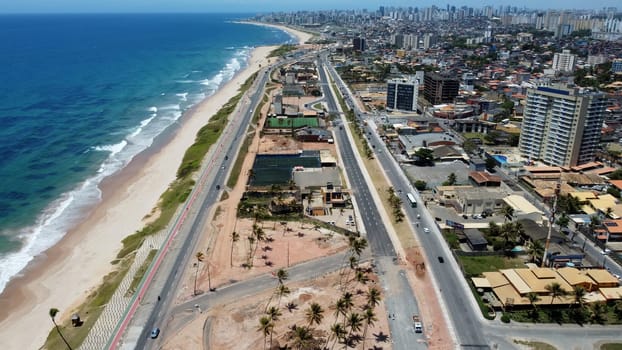 salvador, bahia, brazil - november 20, 2024: workers working on the Atlantic coast of the city of Salvador.
