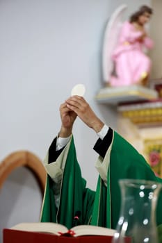 monte santo, bahia, brazil - october 30, 2023: celebration of mass in a catholic church in the city of Monte Santo.