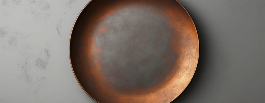 Black, Empty Kitchen Utensil: A Vintage Cast Iron Skillet on a Dark, Textured Background