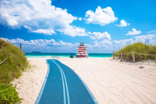 Miami Beach colorful sand beach and lifeguard post jetty view, Florida state, United States of America