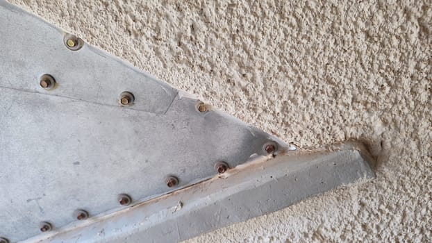 stone texture background, aluminum detail with bolts, architecture. High quality photo