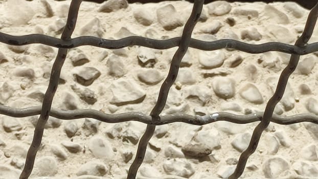stone background, cage wire texture material architecture construction object, shadow . High quality photo