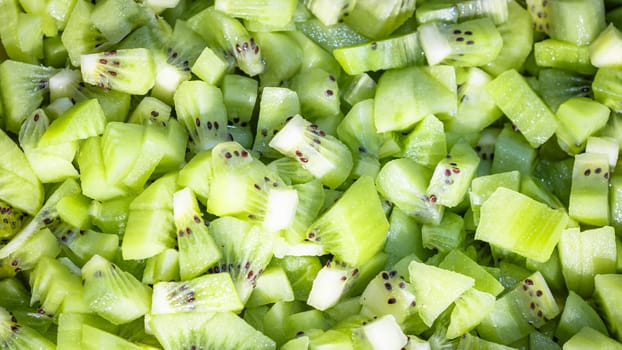 Ripe kiwi fruit. Detail of chopped exotic kiwi fruits used for desserts