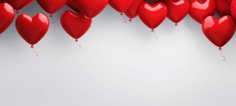 Bright red heart-shaped balloons on a white backdrop, perfect for romantic celebrations