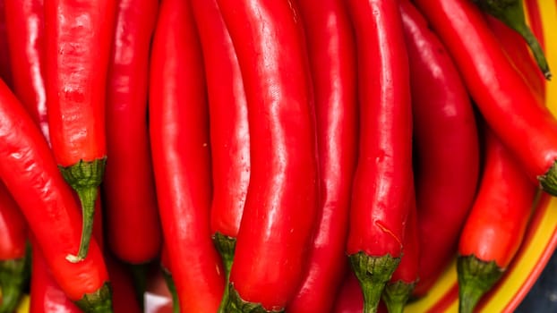 Red hot chilli peppers, close up. Background of red chilies