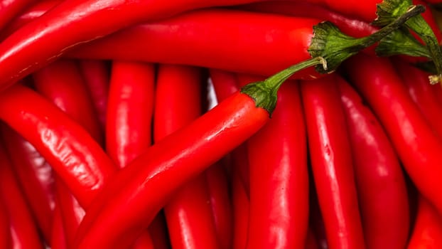 Red hot chilli peppers, close up. Background of red chilies