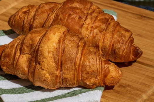 Delicious, fresh croissants. French breakfast concept