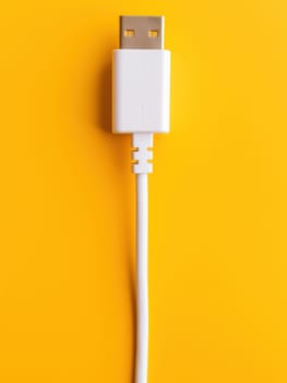 White cable in charge , side view, minimalist style, solid background. Generative AI.