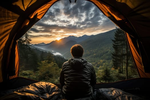 View from tent Young man in his camper observing a good view of a mountain. Generative AI.