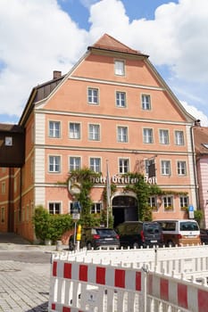 Feuchtwangen, Germany - May 6, 2023: House and hotel along the street in a small German town in Bavaria.