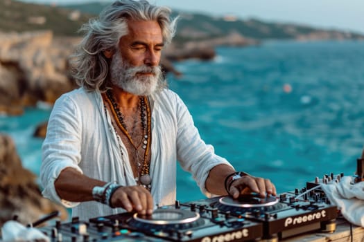 The sounds of the sea and the music of a grey-haired DJ create a unique atmosphere