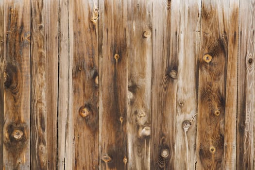 old dry weathered brownish gray wooden planks board surface - full frame background and texture.