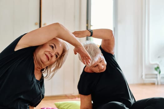 A group of senior women engage in various yoga exercises, including neck, back, and leg stretches, under the guidance of a trainer in a sunlit space, promoting well-being and harmony.