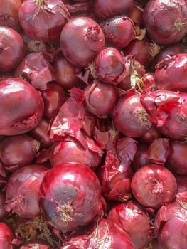 Close-up of fresh red onions. Backgrounds and concepts.