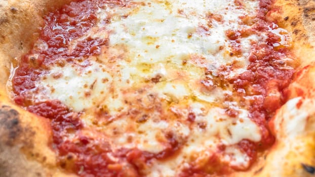 Detail of Italian Pizza Margherita. Italian typical food.