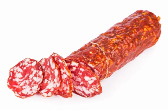 piece of smoked pork sausage on a white background it is isolated