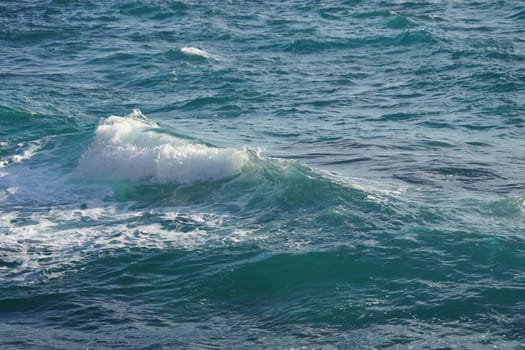 An abstract background of seawater flow under light exposure