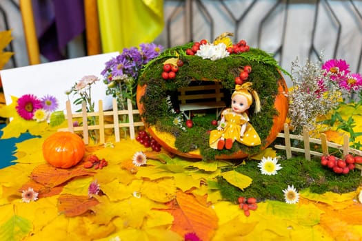 The doll house is made of pumpkin and natural materials.
