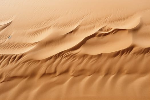 Wavy sand background. Sand texture in the desert or on the beach.
