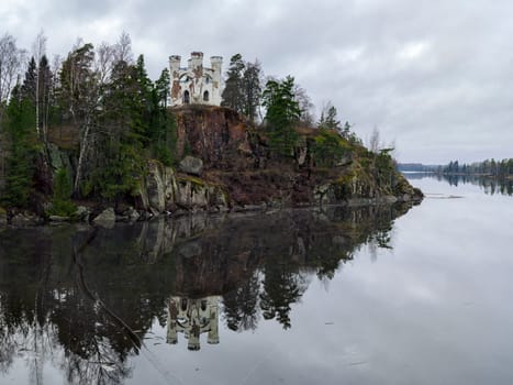 Vyborg, Russia, Leningrad Region - 17.01.2020: Isle of the Dead and the chapel of Ludwigstein may Sunny day. The old Park estate of Monrepo.