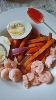 food boiled eggs, shrimp and sweet potato plate, lunch dinner cooking breakfast. High quality photo