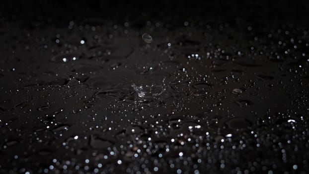 Water drops on black background