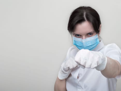 women in medical gloves box, home quarantine, coronavirus pandemic, on a white background, the fight against the virus