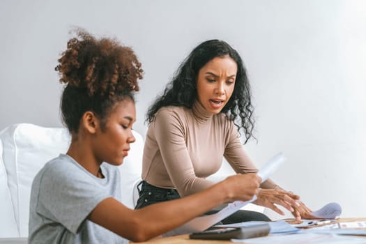 Stressed African American women has financial problems with credit card debt to pay crucial show concept of bad personal money and mortgage pay management crisis.