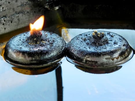 Oil lantern in Chinese temple in Thailand close up
