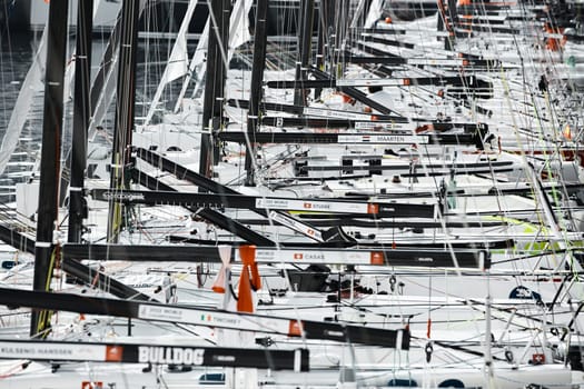 Monaco, Monte-Carlo, 18 October 2022: many sailing boats of the World Championship of J70 class participants stand in a row waiting for the wind for the stage of the sailing race. High quality photo