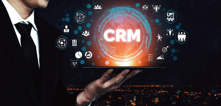 CRM Customer Relationship Management for business sales marketing system concept presented in futuristic graphic interface of service application to support CRM database analysis. uds