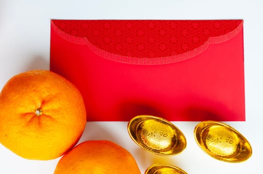Top view of red packet with golden ingot and Mandarin oranges. Customizable space for text.