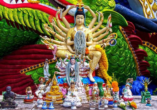 SAMUI, THAILAND - 04 MAR 2013: 18 hands God statue Guan Yin in Wat Plai Laem temple, Samui, Thailand