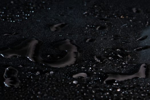 Water drops on black background