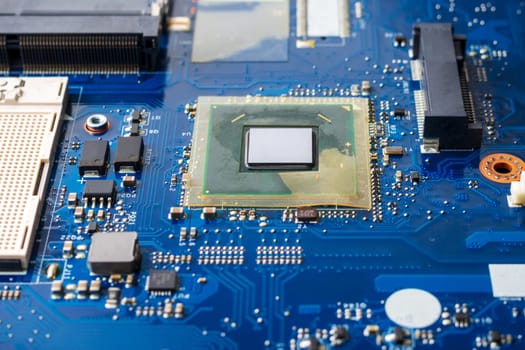 Close up of a printed blue computer circuit board