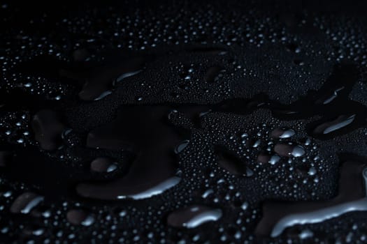 Water drops on black background