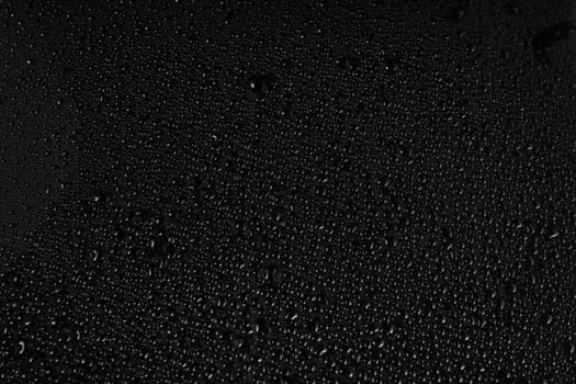 Water drops on black background