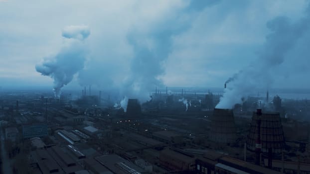 Smoke coming from industrial waste. using new technology to clean it before dispersing. Industrial panoramic landmark, blast furnance of metallurgical production. Concept of environmental pollution. High quality photo