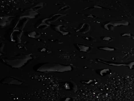 Water drops on black background