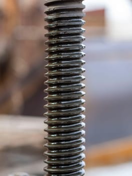 Bolt thread close up. bolt in grease