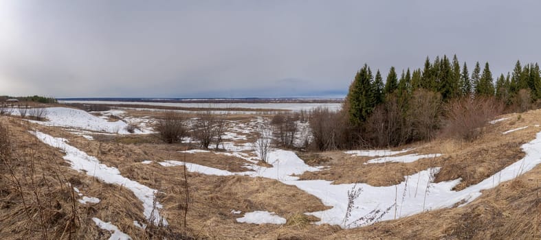 Winter in Russian village, snow, hoarfrost, and nonfreezing small small river