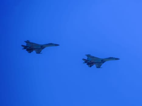 Russia, St. Petersburg - June 24, 2020: Russian military SU-35 plane of the Russian Air Force in flight at the Victory Parade in World War II.