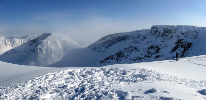 mountain valley in winter under snow, hibiny, russia