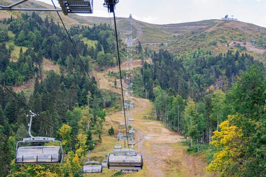 lifts of the mountain cable car on the background of mountains. photo