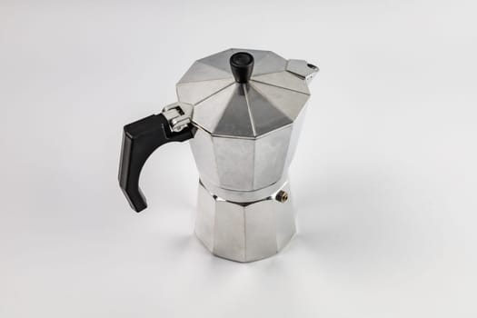 Classic aluminium metallic coffee pot with some parts