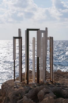 sundial on the shores of the Mediterranean Sea in sunlight in Paphos